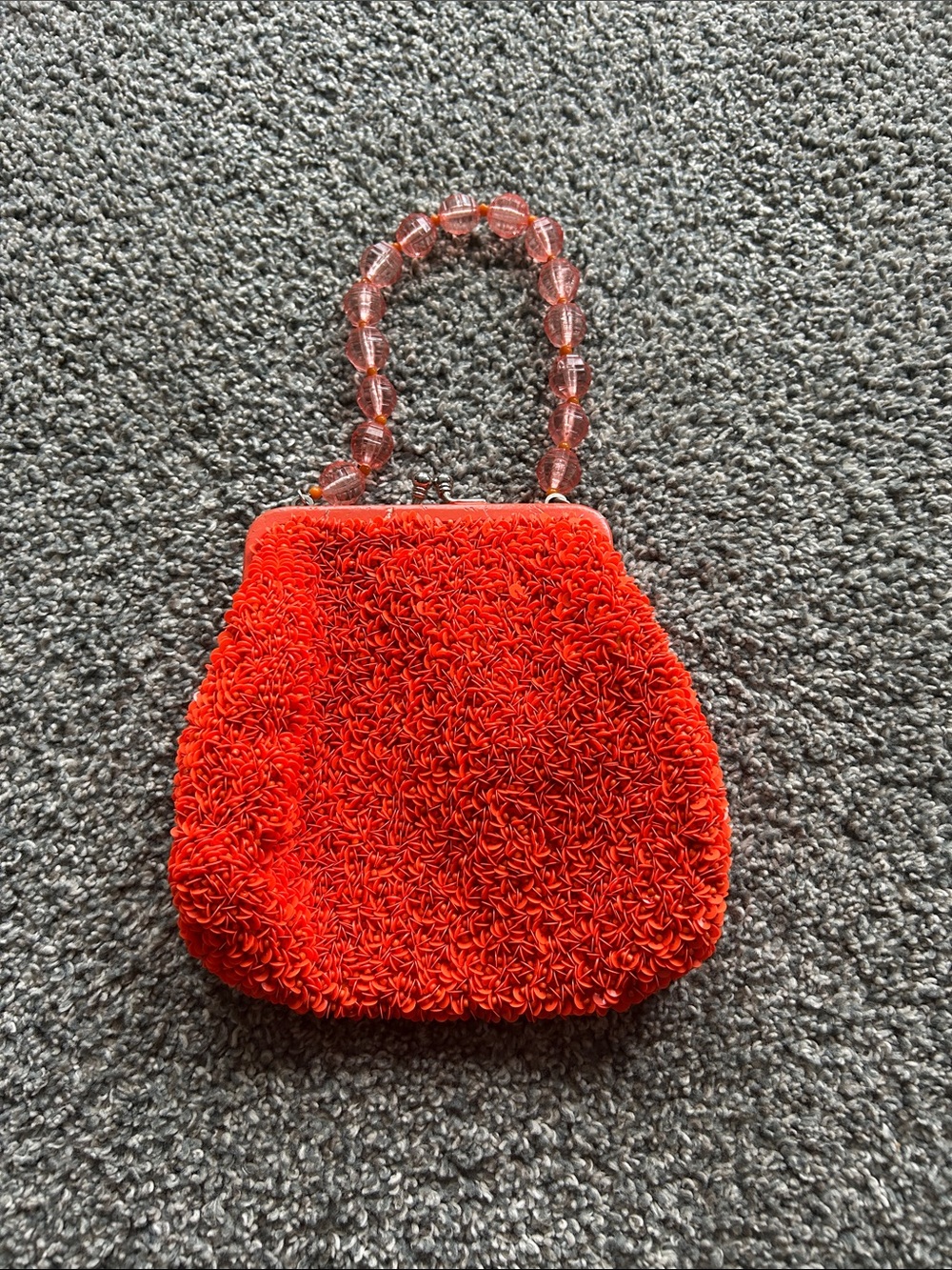 Vibrant Red Textured Beaded-Handle Clutch